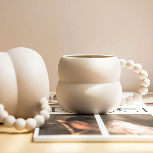 Tasse à café en céramique avec anse en boule – Design créatif et élégant